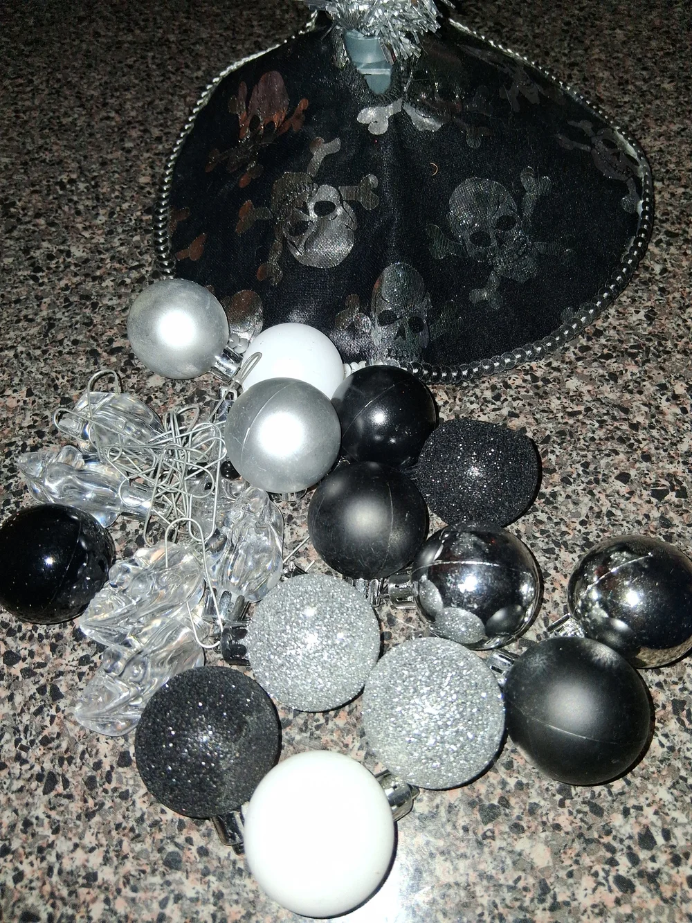 Silver Tinsel Holiday Tree with Black Skull Tree Skirt